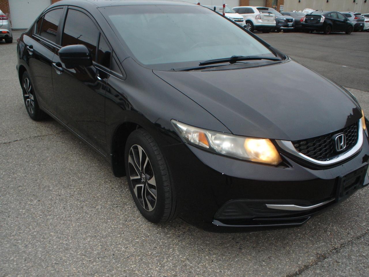 2015 Honda Civic Sedan 4dr Man EX Photo