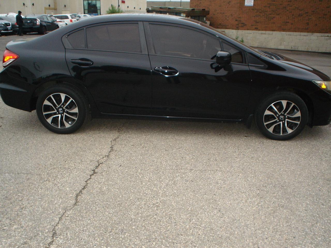 2015 Honda Civic Sedan 4dr Man EX Photo