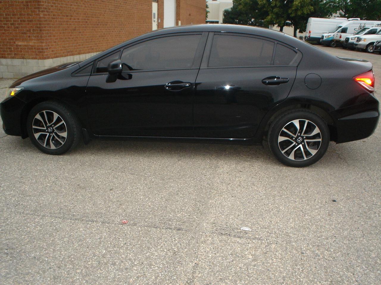 2015 Honda Civic Sedan 4dr Man EX Photo