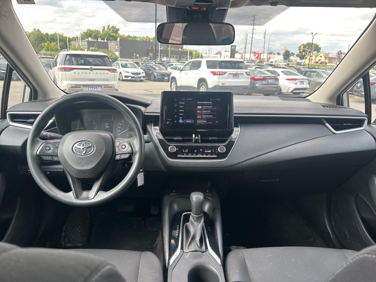 2023 Toyota Corolla LE     Factory Warranty   Clean Carfax Photo