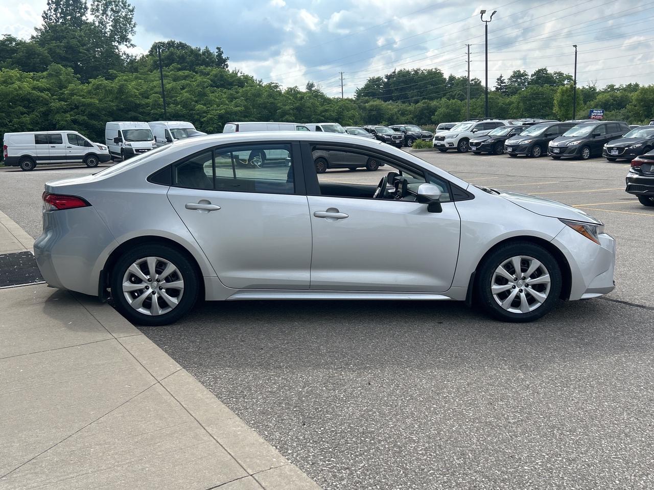 2023 Toyota Corolla LE     Factory Warranty   Clean Carfax Photo