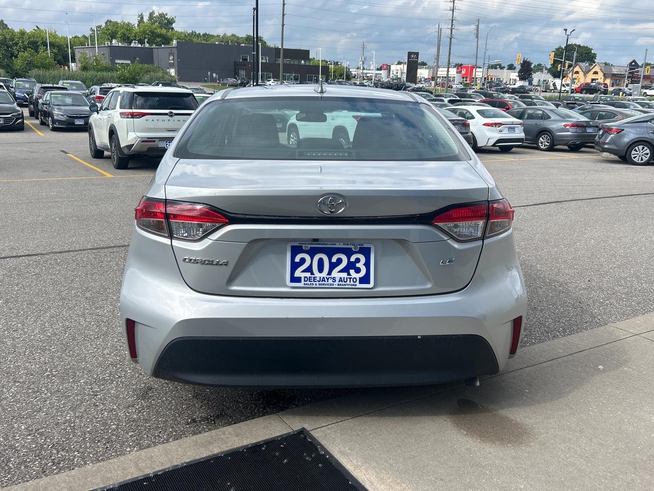 2023 Toyota Corolla LE     Factory Warranty   Clean Carfax Photo