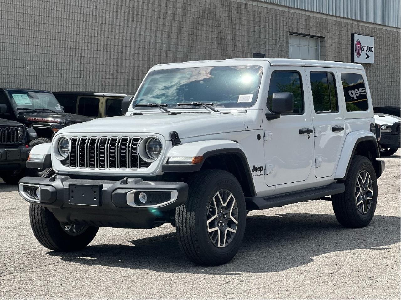 2025 Jeep Wrangler Sahara w/Leather, Technology, Safety, Steps Photo