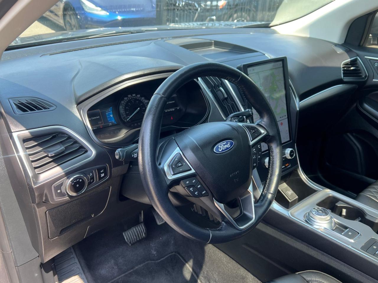 2023 Ford Edge Titanium AWD * 12 SCREEN / PANORAMIC ROOF / B&O SO Photo