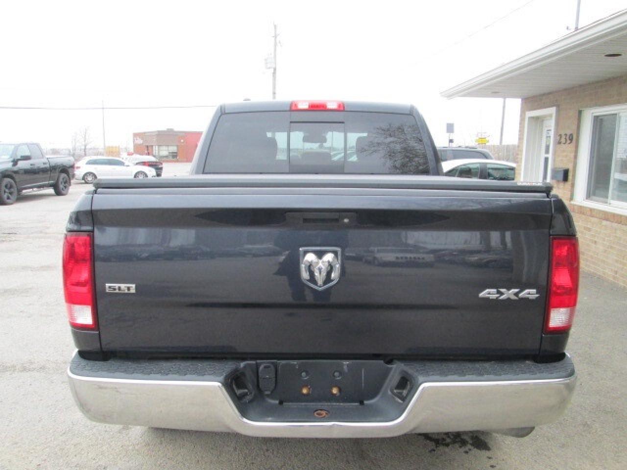 2016 RAM 1500 4WD Crew Cab 140.5  SLT, Power Group Photo4