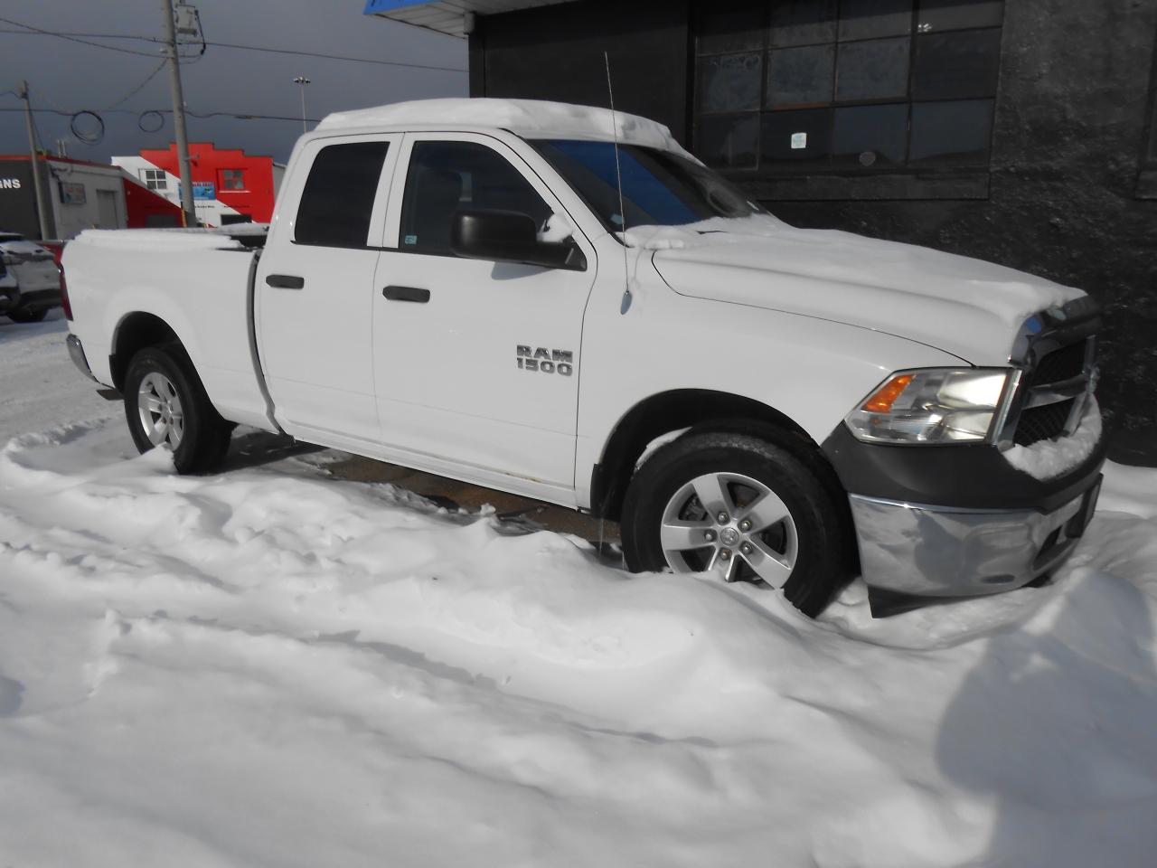 2013 RAM 1500 2WD Quad Cab 140.5  ST PRICE INCLUDES SAFETY Photo0