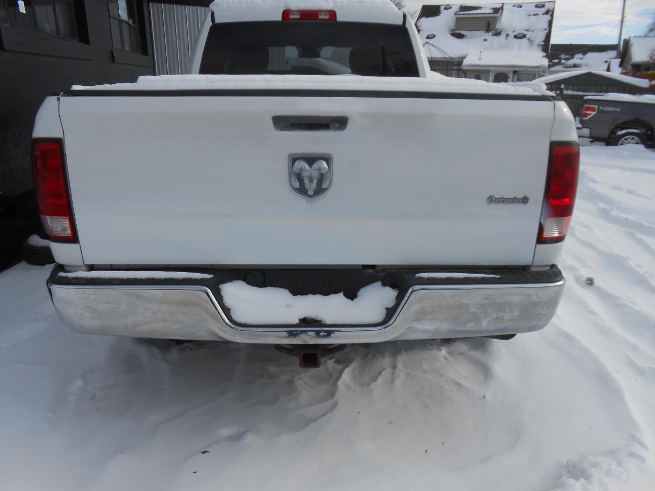 2013 RAM 1500 2WD Quad Cab 140.5  ST PRICE INCLUDES SAFETY Photo