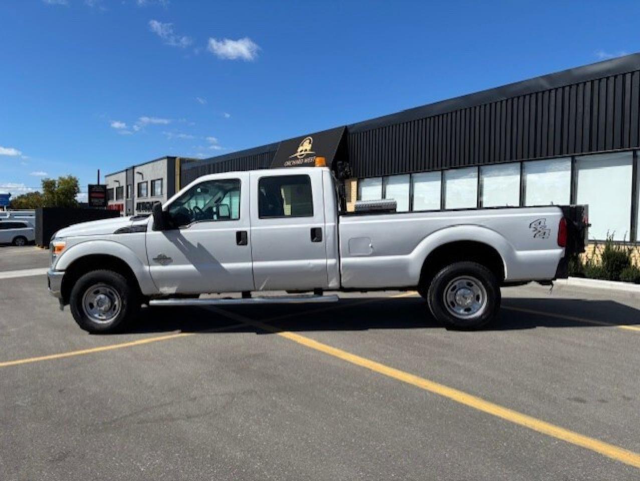 2012 Ford F-350 4WD 6.7L DIESEL-TOMMY LIFT GATE-CREW CAB-LONG BOX Photo