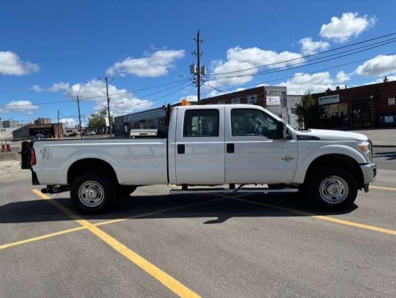 2012 Ford F-350 4WD 6.7L DIESEL-TOMMY LIFT GATE-CREW CAB-LONG BOX Photo