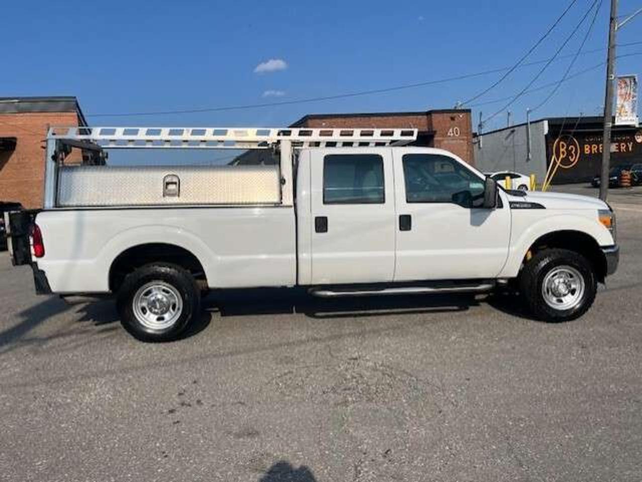 2012 Ford F-350 Super Duty 4WD CREW CAB LONG BOX P/LIFTGATE-RACKS-SHELVES Photo
