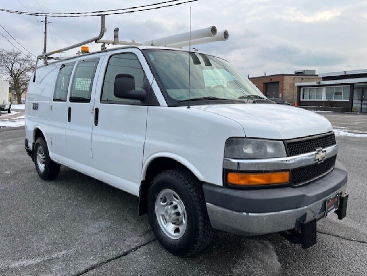 2009 Chevrolet Express 3500 LADDER RACKS-GENERATOR-POWER INVERTER-SHELVES Photo