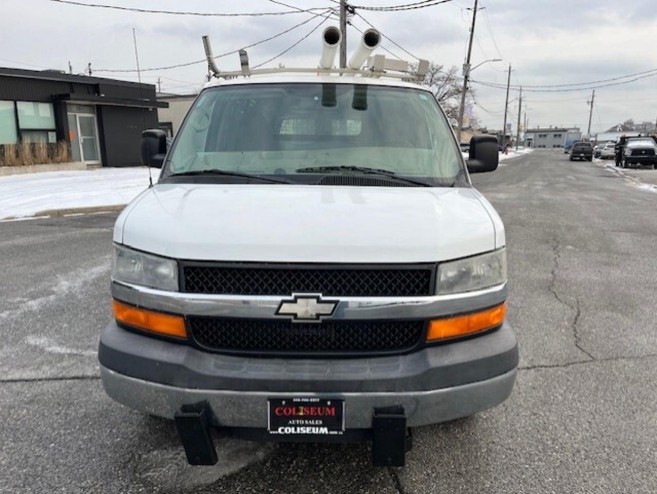2009 Chevrolet Express 3500 LADDER RACKS-GENERATOR-POWER INVERTER-SHELVES Photo