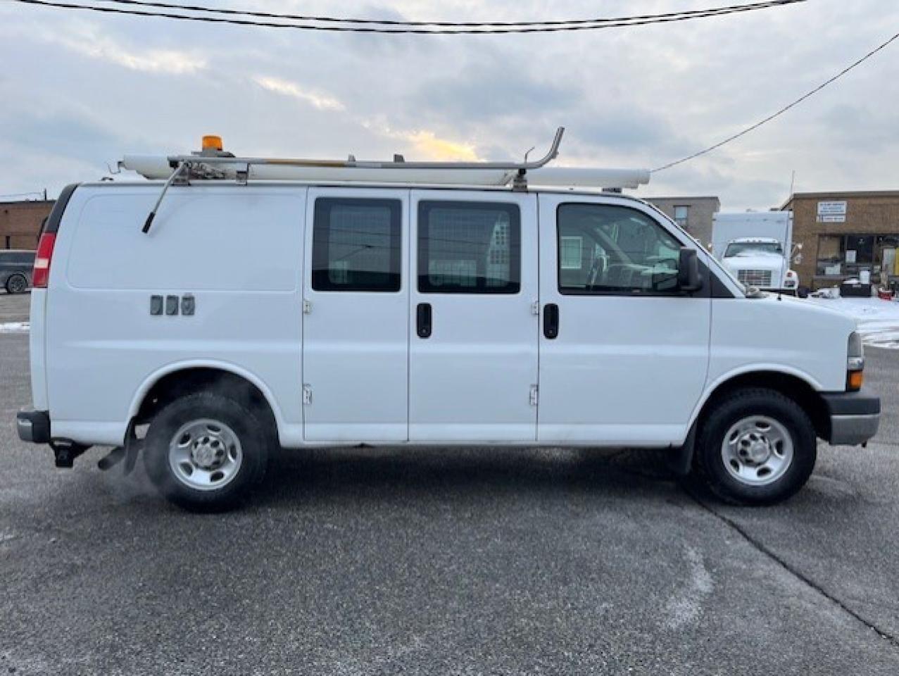 2009 Chevrolet Express 3500 LADDER RACKS-GENERATOR-POWER INVERTER-SHELVES Photo