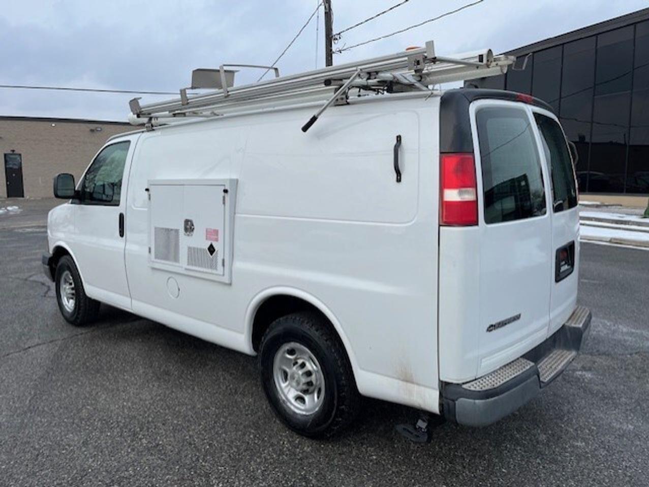 2009 Chevrolet Express 3500 LADDER RACKS-GENERATOR-POWER INVERTER-SHELVES Photo