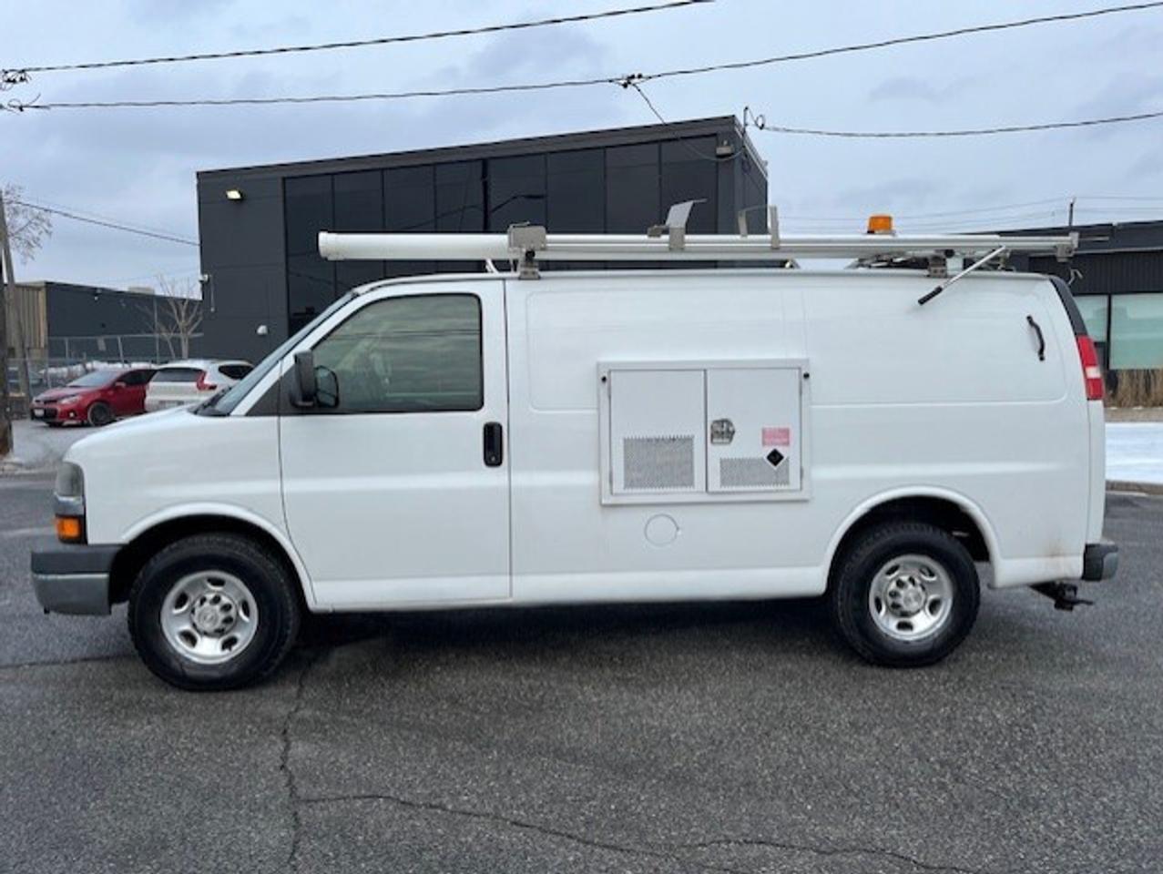 2009 Chevrolet Express 3500 LADDER RACKS-GENERATOR-POWER INVERTER-SHELVES Photo