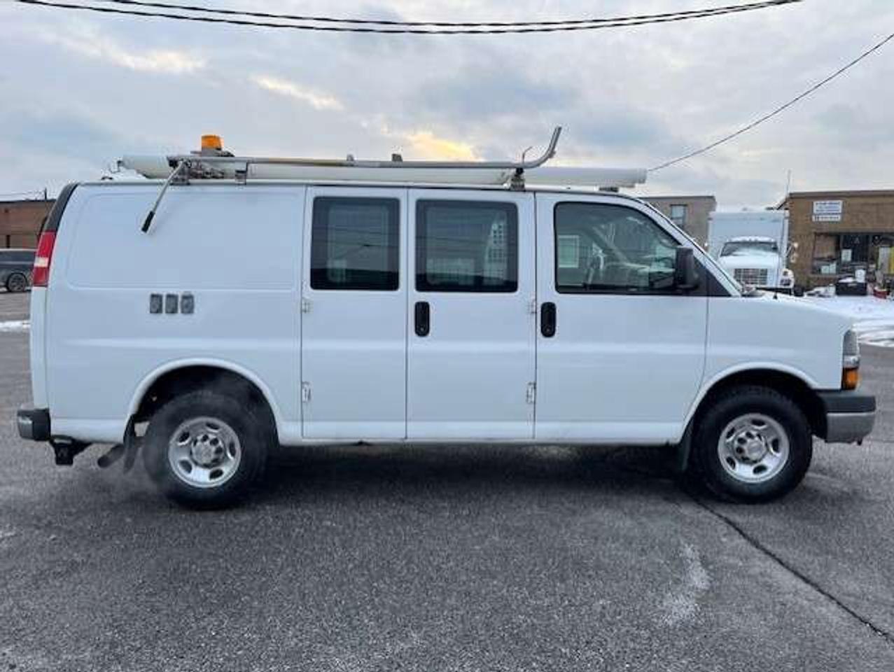 2009 Chevrolet Express 3500 3500 LADDER RACKS-GENERATOR-POWER INVERTER-SHELVES Photo