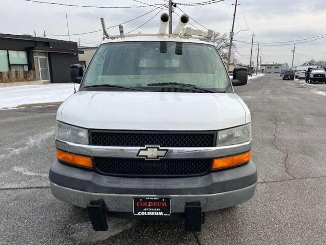 2009 Chevrolet Express 3500 3500 LADDER RACKS-GENERATOR-POWER INVERTER-SHELVES Photo