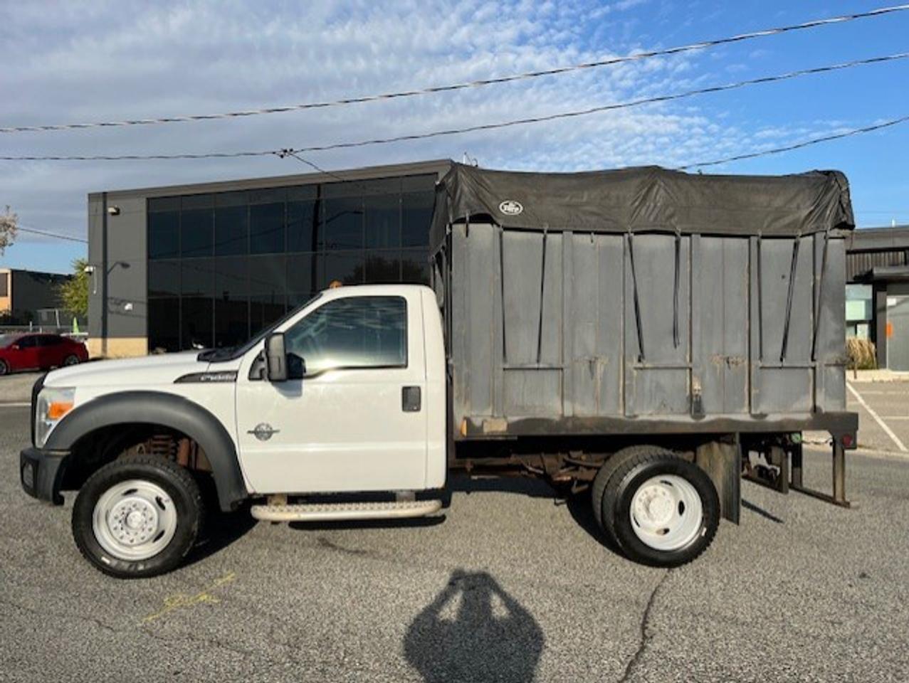 2011 Ford F-550 4WD 6.7L POWER STROKE DIESEL FLAT BED STAKE TRUCK! Photo