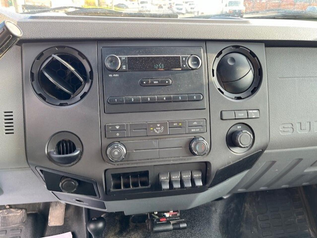 2011 Ford F-550 4WD 6.7L POWER STROKE DIESEL FLAT BED STAKE TRUCK! Photo