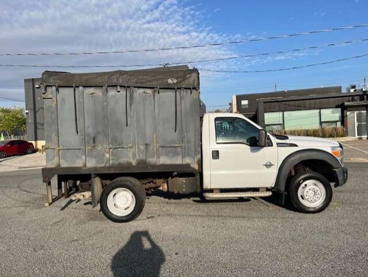 2011 Ford F-550 4WD 6.7L POWER STROKE DIESEL FLAT BED STAKE TRUCK! Photo