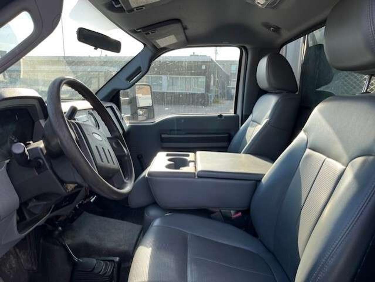 2011 Ford F-550 4WD 6.7L POWER STROKE DIESEL FLAT BED STAKE TRUCK! Photo