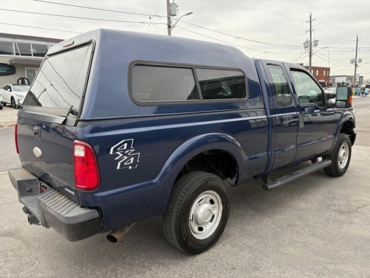 2012 Ford F-250 4WD SUPER CAB-SHORT BOX-CAP-CARGO SLIDE-CERTIFIED Photo