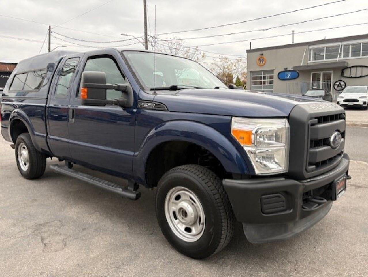 2012 Ford F-250 4WD SUPER CAB-SHORT BOX-CAP-CARGO SLIDE-CERTIFIED Photo