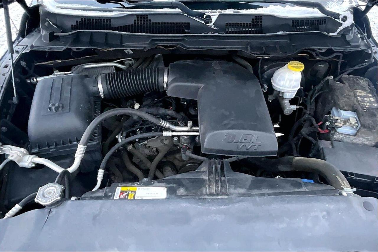 2018 RAM 1500 Black Express Quad Cab | Spray Liner | 4X4 Photo