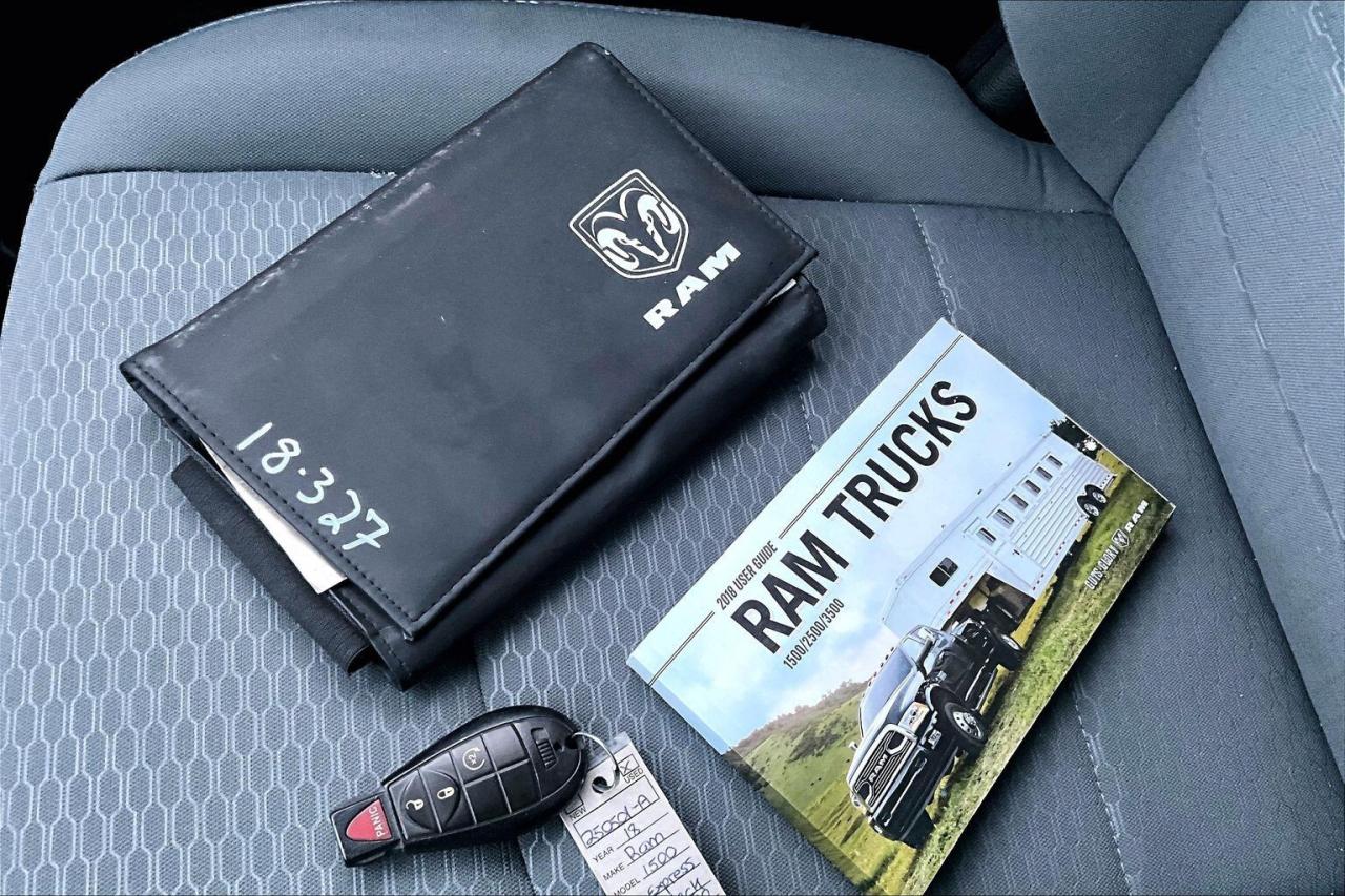 2018 RAM 1500 Black Express Quad Cab | Spray Liner | 4X4 Photo