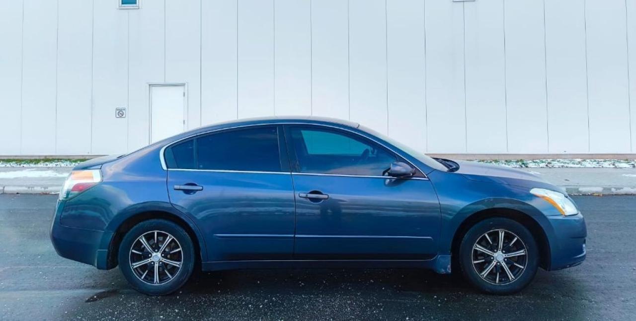 2012 Nissan Altima 2dr Coupe I4 CVT 2.5 S Photo