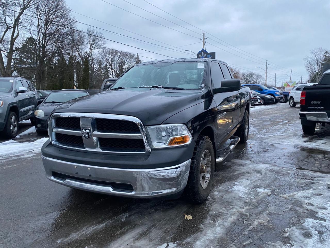 2012 RAM 1500 4WD QUAD CAB 140.5" ST Photo2