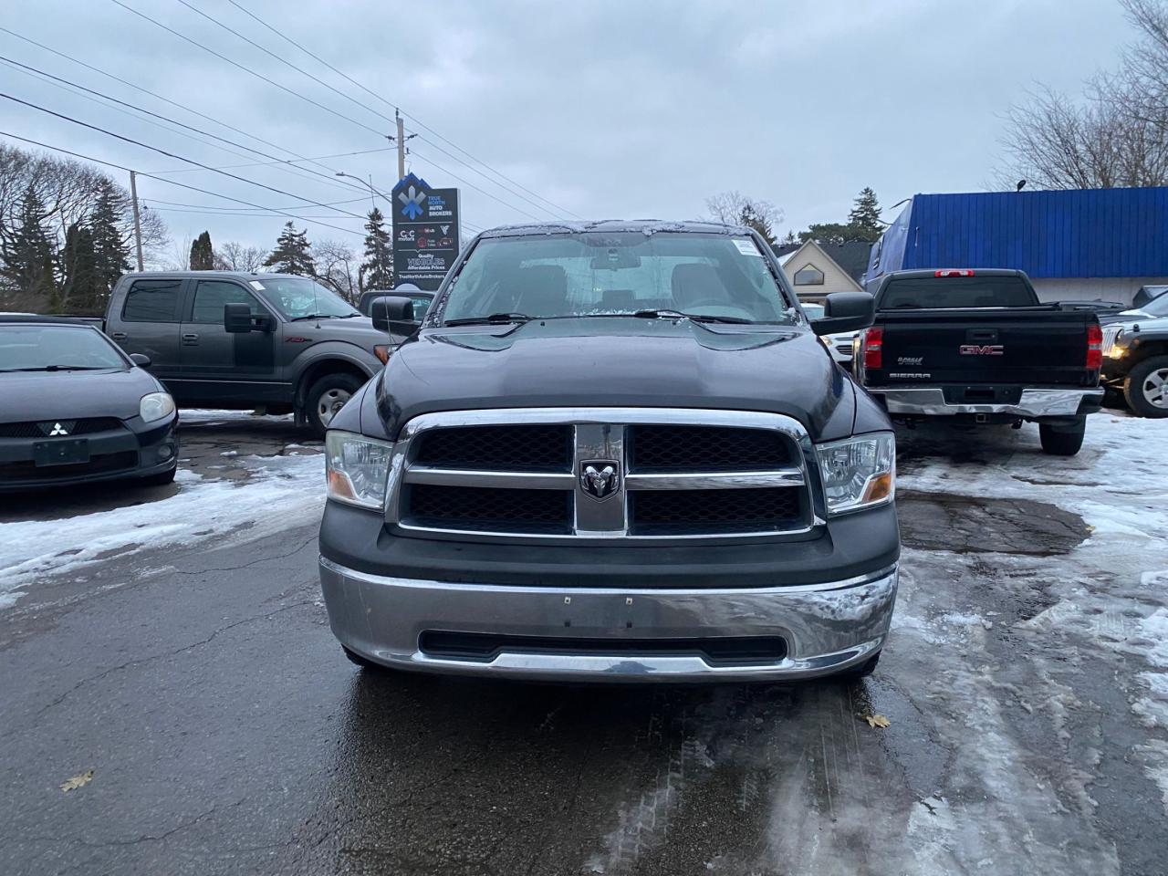 2012 RAM 1500 4WD QUAD CAB 140.5" ST - Photo #2