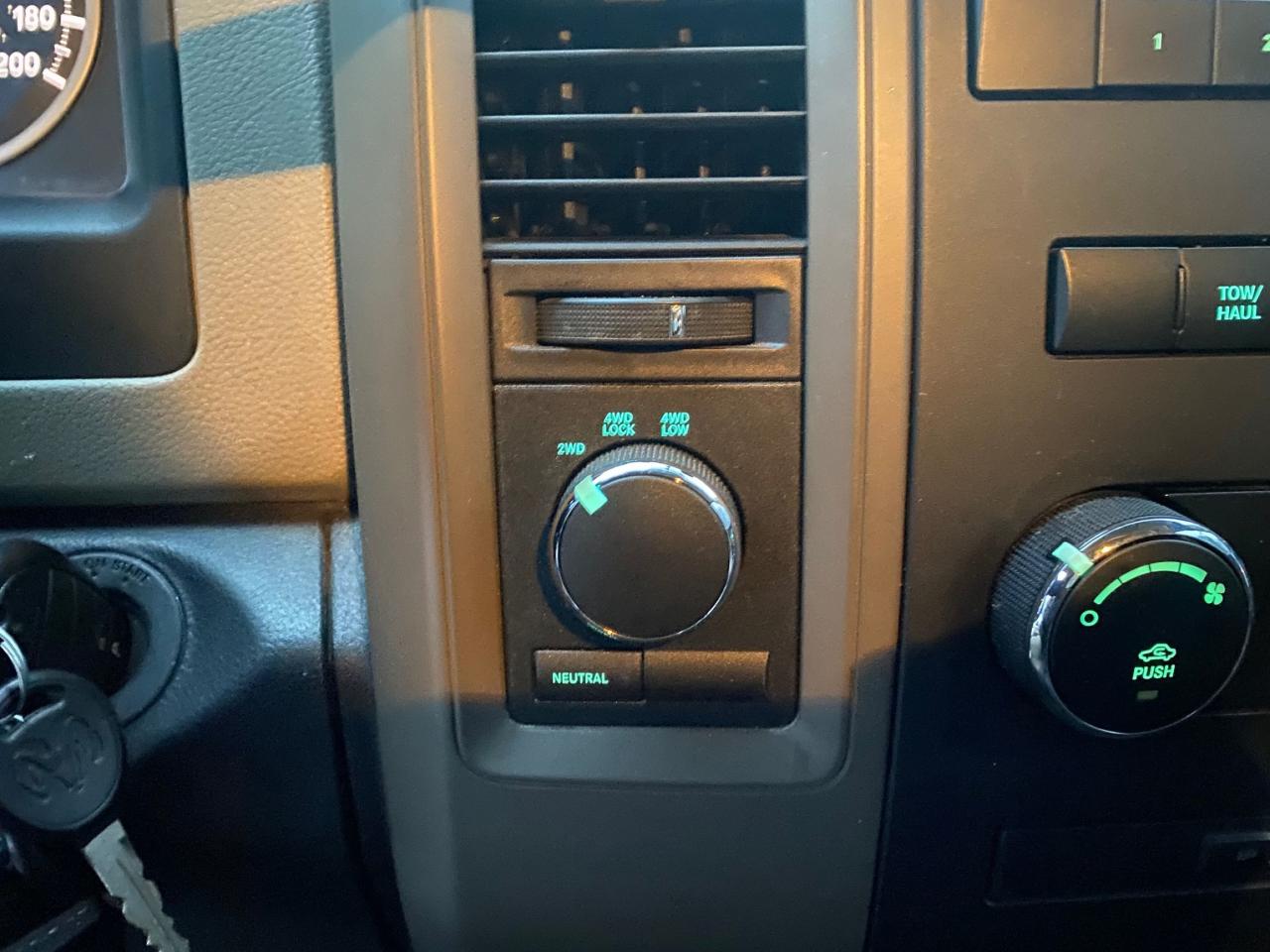 2012 RAM 1500 4WD QUAD CAB 140.5" ST - Photo #16