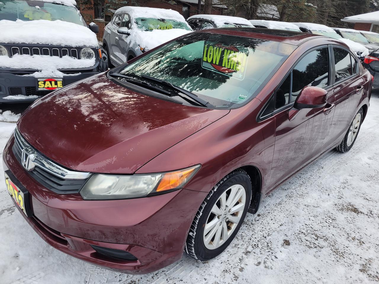 <p>Accident Free, Certified, Service History, Financing Available & Trade-ins Welcome!</p><p>CONTINENTAL ContiPro Contact Tires with HANKOOK i*Pike RC001 Snow Tires on Rims.</p><p>The 2012 Honda Civic 4dr Auto EX is a reliable, redesigned ninth-generation sedan featuring a fuel-efficient 1.8L 140-hp engine, automatic transmission, Bluetooth, i-MID display, and standard stability control, known for good ownership costs.</p><p>Key Features:</p><p>Engine: 1.8L SOHC i-VTEC 4-cylinder (140 hp, 128 lb-ft torque).</p><p>Transmission: 5-speed automatic.</p><p>Drivetrain: Front-Wheel Drive (FWD).</p><p>Interior: Leather-wrapped steering wheel, 60/40 split rear seats, adjustable head restraints, power windows (driver auto-up/down), A/C with filtration, rear heat ducts, i-MID display.</p><p>Technology: Bluetooth HandsFreeLink, ECON mode button, Maintenance Minder, remote trunk release.</p><p>Safety: Electronic Stability Control (ESP) became standard for 2012.&nbsp;</p><p>Whats New for 2012 (Ninth Gen):</p><p>Redesigned exterior and roomier interior.</p><p>Re-engineered 1.8L engine for improved efficiency.</p><p>Standard stability control across all trims.&nbsp;</p><p>Reliability:</p><p>Excellent ownership costs with low frequency and severity of repairs.</p><p>Known for longevity, often lasting 200k-300k+ miles with proper maintenance.</p>