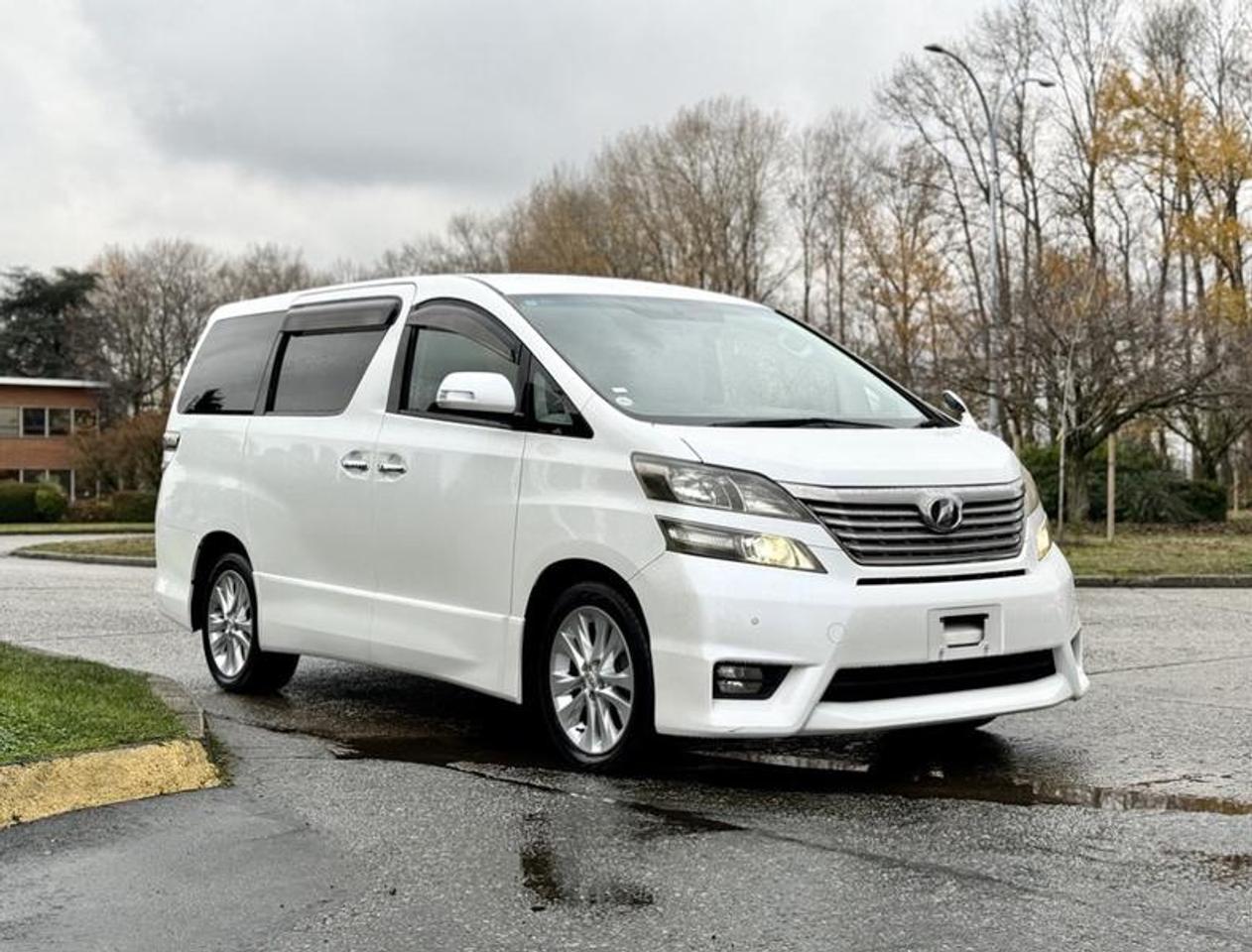 This 2009 Toyota Vellfire 2.4 AWD is a right-hand-drive Japanese import equipped with a 2.4L 4-cylinder engine, automatic transmission and all-wheel drive, and features a white exterior with a black cloth interior. It includes seating for six, power sliding door, leg rest extensions, rear air conditioning, backup camera, air conditioning and heat, AM/FM radio, and power windows, power door locks and power mirrors. The vehicle measures approximately 15 feet 10 inches long, 6 feet 1 inch wide and 6 feet 4 inches high. This unit has passed BC inspections. This item is currently OFFSITE. You must register an appointment with our office to schedule an offsite viewing. Appointments must be made a minimum of one business day in advance (and as defined by the days that Repo.com is open for business) before your appointment can be scheduled and confirmed. We may, at our own discretion, instead opt to transport smaller items to Repo.coms main yard for viewing purposes.  $17,580.00 plus $375 processing fee, $17,955.00 total payment obligation before taxes.   Listing report, warranty, contract commitment cancellation fee, financing available on approved credit (some limitations and exceptions may apply). All above specifications and information is considered to be accurate but is not guaranteed and no opinion or advice is given as to whether this item should be purchased. We do not allow test drives due to theft, fraud, acts of vandalism and undetectable impaired driving. Instead we provide the following benefits: Complimentary Warranty (with options to extend), Limited Money Back Satisfaction Guarantee on Fully Completed Contracts, Contract Commitment Cancellation, and an Open-Ended Sell-Back Option. Ask seller for details or call 604-522-REPO(7376) to confirm listing availability.