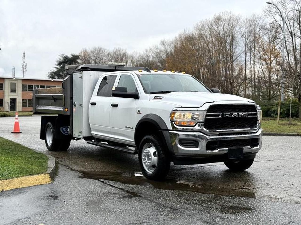 This 2021 Ram 5500 crew cab 4x4 DRW Cummins dump truck is equipped with a 6.7L 6-cylinder engine, automatic transmission and four-wheel drive, and features a white exterior with a grey cloth interior. It includes a 9-foot dump box measuring approximately 7 feet 6 inches wide, auxiliary switches, 4x4 gear selector, DEF system, tow package, engine push start, USB, Type-C and 12V inputs, cruise control, air conditioning and heat, and an AM/FM radio, along with power windows, power door locks and power mirrors. Overall vehicle dimensions are about 24 feet 11 inches long, 8 feet 2 inches wide and 7 feet 1 inch high, with a GVWR of 8,846 kg (19,500 lb). This item is currently OFFSITE. You must register an appointment with our office to schedule an offsite viewing. Appointments must be made a minimum of one business day in advance (and as defined by the days that Repo.com is open for business) before your appointment can be scheduled and confirmed. We may, at our own discretion, instead opt to transport smaller items to Repo.coms main yard for viewing purposes.  $88,710.00 plus $375 processing fee, $89,085.00 total payment obligation before taxes.  Listing report, warranty, contract commitment cancellation fee, financing available on approved credit (some limitations and exceptions may apply). All above specifications and information is considered to be accurate but is not guaranteed and no opinion or advice is given as to whether this item should be purchased. We do not allow test drives due to theft, fraud, acts of vandalism and undetectable impaired driving. Instead we provide the following benefits: Complimentary Warranty (with options to extend), Limited Money Back Satisfaction Guarantee on Fully Completed Contracts, Contract Commitment Cancellation, and an Open-Ended Sell-Back Option. Ask seller for details or call 604-522-REPO(7376) to confirm listing availability.