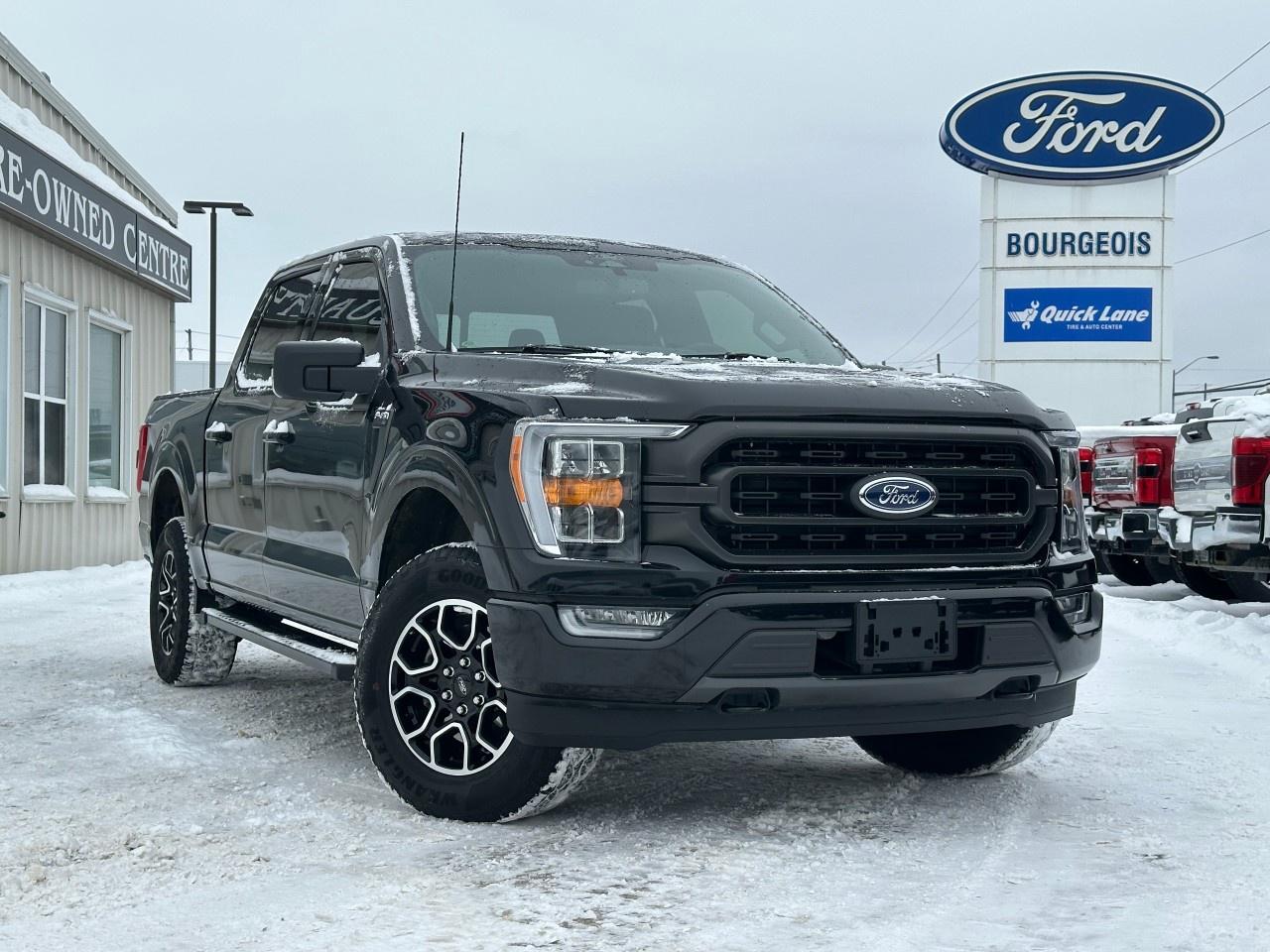 <p>Experience the power and capability of the 2022 Ford F-150 XLT 4WD SuperCrew in an elegant Black finish. With its rugged 4×4 drivetrain, this truck is built to conquer challenging terrains while offering a robust driving experience.</p><p>The exterior showcases a commanding presence with its bold design, complemented by heated mirrors. Step inside the spacious Black interior, where comfort meets functionality. You'll appreciate features such as air conditioning and power windows, ensuring every drive is a pleasure.</p><p>Stay connected and entertained with smart device integration, a backup camera for confident reversing, and a Bluetooth connection that keeps your calls and music hands-free. Safety is prioritized with advanced systems like brake assist and lane assist, providing peace of mind on every journey. Utilize the keyless entry system for added convenience, along with a wi-fi hotspot to keep you connected wherever you go.</p><p>This Ford F-150 XLT is the perfect fit for adventure seekers and professionals looking for a reliable partner on the road. Contact us today to schedule a test drive and learn more about how this robust truck can meet your needs.</p> <p><strong>Why Choose the Bourgeois Auto Group?</strong></p><p>For 80 years, Bourgeois Auto Group has been delivering exceptional automotive experiences. Our factor trained teams work to ensure you receive the shopping experience you deserve; whether you're looking for a new or new-to-you vehicle.</p><p>Shop 24/7 with our online showroom and chat service, ensuring convenience every step of the way. No hidden fees, full disclosure, and every pre-owned vehicle comes with a Carfax® report for peace of mind.</p><p>We offer a wide selection of pre-owned vehicles, all competitively priced using real-time market data. Get the best deal on your purchase and trade-in with our free Live Market Analysis report.</p><p>Looking to sell your car? We buy any make or modelno purchase required. Our simple to use online trade valuation tool will provide you with a clear, transparent selling experience whether you buy our car or not.</p><p>Backed by hundreds dedicated employees across 4 convenient locations, were here to meet all your automotive needs. Visit us in Midland or Parry Sound and explore our inventory or schedule your next service today.</p> <p><strong>Financing Your Next Vehicle with Bourgeois Motors Ford in Midland:</strong></p><p>At Bourgeois Motors Ford, we make financing your next vehicle simple and stress-free! Our team works with trusted lenders to find flexible options tailored to your budget. Drive away with confidenceapply today!</p><p>Take advantage of our online pre-qualification tool, backed by Equifax and TD Bank to find the payment that works for you. Simply <a href=https://www.bourgeoismotors.com/free-credit-check/ rel=nofollow><strong>CLICK HERE</strong></a><strong> </strong>to use our secure online credit tool with no impact to your credit.</p>