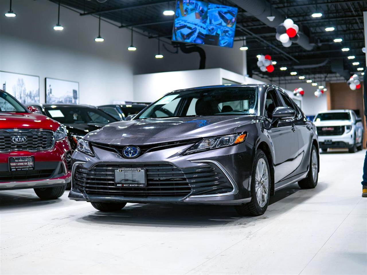 2021 Toyota Camry HYBRID LE | NO ACCIDENTS | 5 SERV REC | ALLOYS | Photo