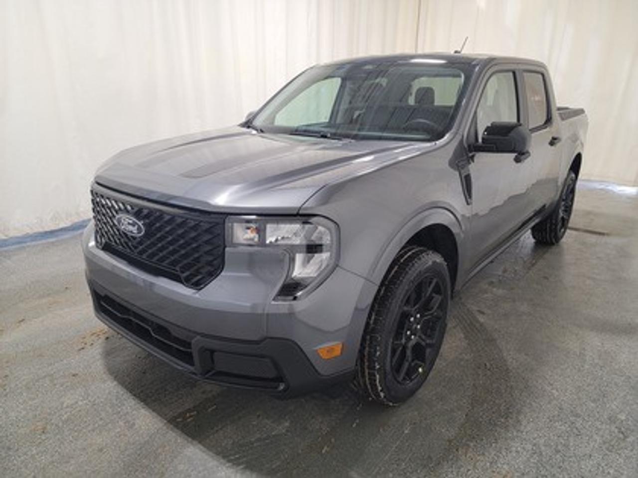 This 2026 Ford Maverick XLT 301A stands out in Carbonized Grey Metallic, combining the versatility of a pickup with the efficiency and convenience of a compact truck. Equipped with the 2.5L Hybrid engine this truck delivers 191 horsepower and 155 lb-ft of torque, with a 94-kW electric motor paired with a CVT transmission for smooth performance and an estimated 6.4L/100 km (44 miles per gallon) combined fuel economy.

This vehicle comes with the All-Weather Packageready to take on any season! 

Snow, rain, mud, or sunshinethis vehicle is built for it all! The All-Weather Package adds extra protection where it matters most, with premium mud flaps to shield your paint from road debris, all-weather floor mats to protect your interior from lifes messes, and Xpel paint protection to help guard against those infuriating rock chips. Drive with confidence, knowing your investment is protected from Regina's elements. 

Key Features:
Tire Inflator and Sealant Kit
FordPass Connectivity for remote vehicle control
Ford Co-Pilot360
Trailer Sway Control
Remote Keyless Entry
17 Carbonized Grey-Painted Aluminum Wheels
P225/65R17 A/S BSW Wheels
Lane Keeping Aid
Rear View Camera
Automatic LED High Beams
LED Headlamps
Manual Tailgate Lock
8 Center Stack Screen
Electronic Stability Control
Cruise Control
4K Tow Package
XLT Luxury Package
Black Appearance Package

The 2026 Maverick XLT 301A is engineered for Saskatchewans extreme weather and diverse driving conditions, offering a comfortable, tech-savvy, and fuel-efficient experience. With heated front seats, rear under-seat storage bins, and advanced driver-assist technologies, this truck delivers both practicality and peace of mind for everyday driving.

Bennett Dunlop Ford, proudly serving Regina for over 40 years, is conveniently located at 770 Broad Street. With over 3,500 Google reviews, our reputation reflects our commitment to providing a fast, easy, and enjoyable vehicle-buying experience. We eliminate the hassle with no admin or documentation fees, transparent upfront pricing lets you shop with total confidence. But were more than just a dealershipwere driven to make a difference by supporting local community initiatives and events that matter to you. Visit Bennett Dunlop Ford today and experience why were Reginas trusted choice for quality vehicles, exceptional service, and a genuine commitment to driving change in our community!