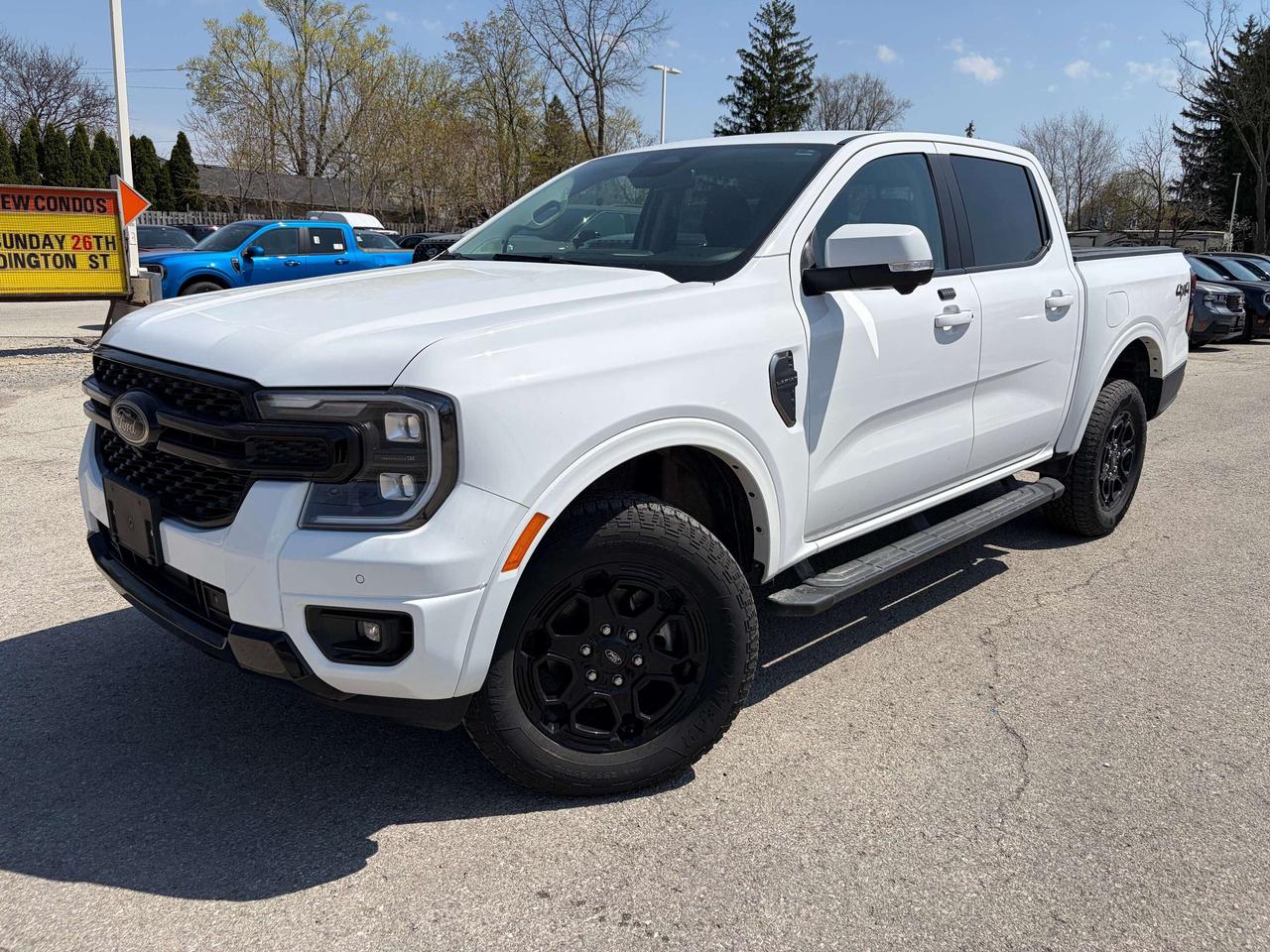 <p>Looking for a pickup that blends rugged capability with refined comfort? Feast your eyes on this brand-new 2025 Ford Ranger LARIAT 4WD SuperCrew, available now at Winegard Ford! This truck is ready to tackle any adventure, from navigating city streets to conquering off-road trails. With its striking Oxford White exterior and luxurious Ebony leather-trimmed interior, this Ranger makes a bold statement wherever you go.</p><p>&nbsp;</p><p>This Ranger is packed with features designed to enhance your driving experience. The SuperCrew configuration offers ample space for passengers and cargo, making it perfect for families and weekend warriors alike. The automatic transmission ensures smooth and effortless driving, while the 4WD system provides the confidence you need to handle challenging conditions.</p><p>&nbsp;</p><p>Here are some of the standout features that make this Ranger truly exceptional:</p><p><br><br></p><ul><li><strong>Black Appearance Package:</strong> Turn heads with a sleek, aggressive look that elevates the Rangers style.</li></ul><p>&nbsp;</p><ul><li><strong>Advanced Towing Package:</strong> Confidently haul your gear with this package, designed to make towing a breeze.</li></ul><p>&nbsp;</p><ul><li><strong>Running Boards - Black:</strong> Step in and out of your truck with ease and add a touch of style.</li></ul><p>&nbsp;</p><ul><li><strong>FLR Liners All WTHR+CRPT MATS:</strong> Protect your trucks interior from the elements with these durable and stylish floor liners.</li></ul><p>&nbsp;</p><ul><li><strong>SECURICODE Wireless Keypad:</strong> Enjoy keyless entry and added security with this convenient feature.</li></ul><p><br><br></p><p><strong><em>Powered by AutoIntelligence&trade;</em></strong><br>Vehicle information has been generated using artificial intelligence and is provided for informational purposes only. While efforts are made to ensure accuracy, please confirm all details directly with the dealer.</p><p>&nbsp;</p>