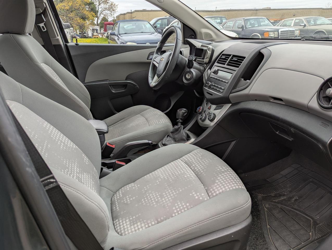 2013 Chevrolet Sonic "Gas MISER" certified + FREE 6M warranty. Photo