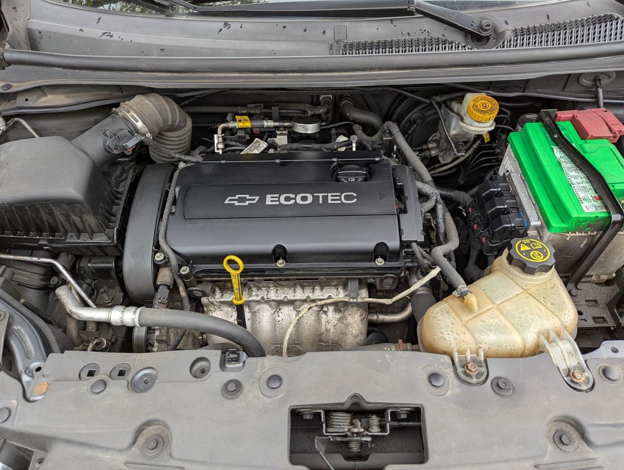 2013 Chevrolet Sonic "Gas MISER" certified + FREE 6M warranty. Photo