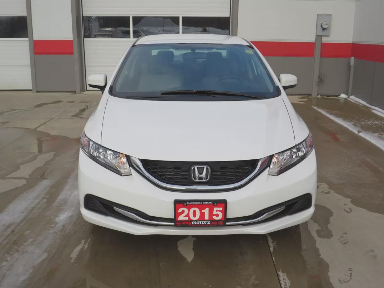 2015 Honda Civic Sedan LX (**VERY RARE!!**EXTREMELY LOW KM!**SAFETY/CERTIFIED!!**CLEAN TITLE/NO ACCIDENTS!!**AUTOMATIC**REVERSE CAMERA**A/C**HEATES SEATS**AUX**BLUETOOTH**CRUISE CONTROL**) Photo