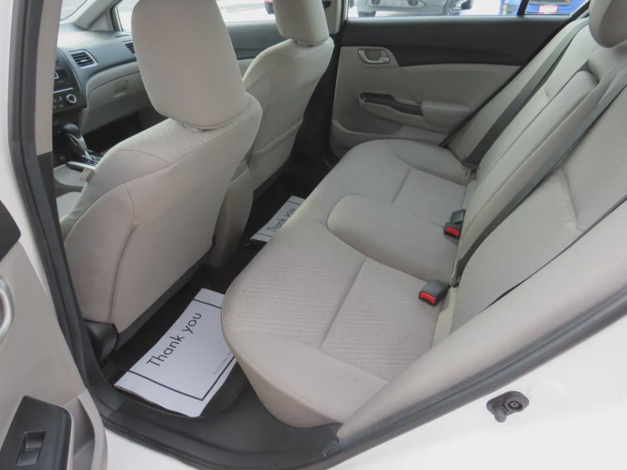 2015 Honda Civic Sedan LX (**VERY RARE!!**EXTREMELY LOW KM!**SAFETY/CERTIFIED!!**CLEAN TITLE/NO ACCIDENTS!!**AUTOMATIC**REVERSE CAMERA**A/C**HEATES SEATS**AUX**BLUETOOTH**CRUISE CONTROL**) Photo