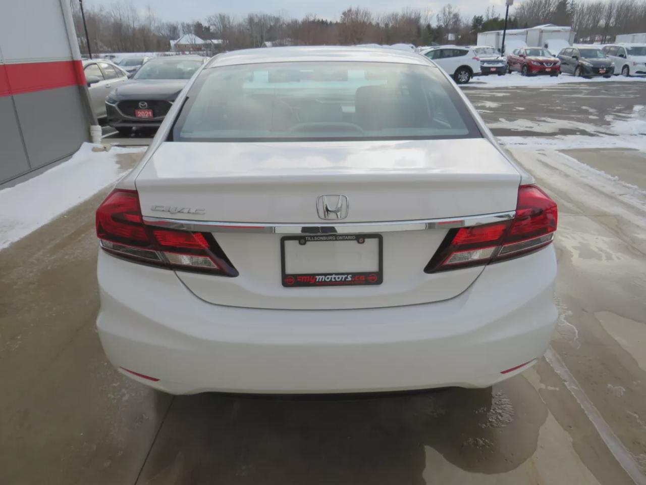 2015 Honda Civic Sedan LX (**VERY RARE!!**EXTREMELY LOW KM!**SAFETY/CERTIFIED!!**CLEAN TITLE/NO ACCIDENTS!!**AUTOMATIC**REVERSE CAMERA**A/C**HEATES SEATS**AUX**BLUETOOTH**CRUISE CONTROL**) Photo