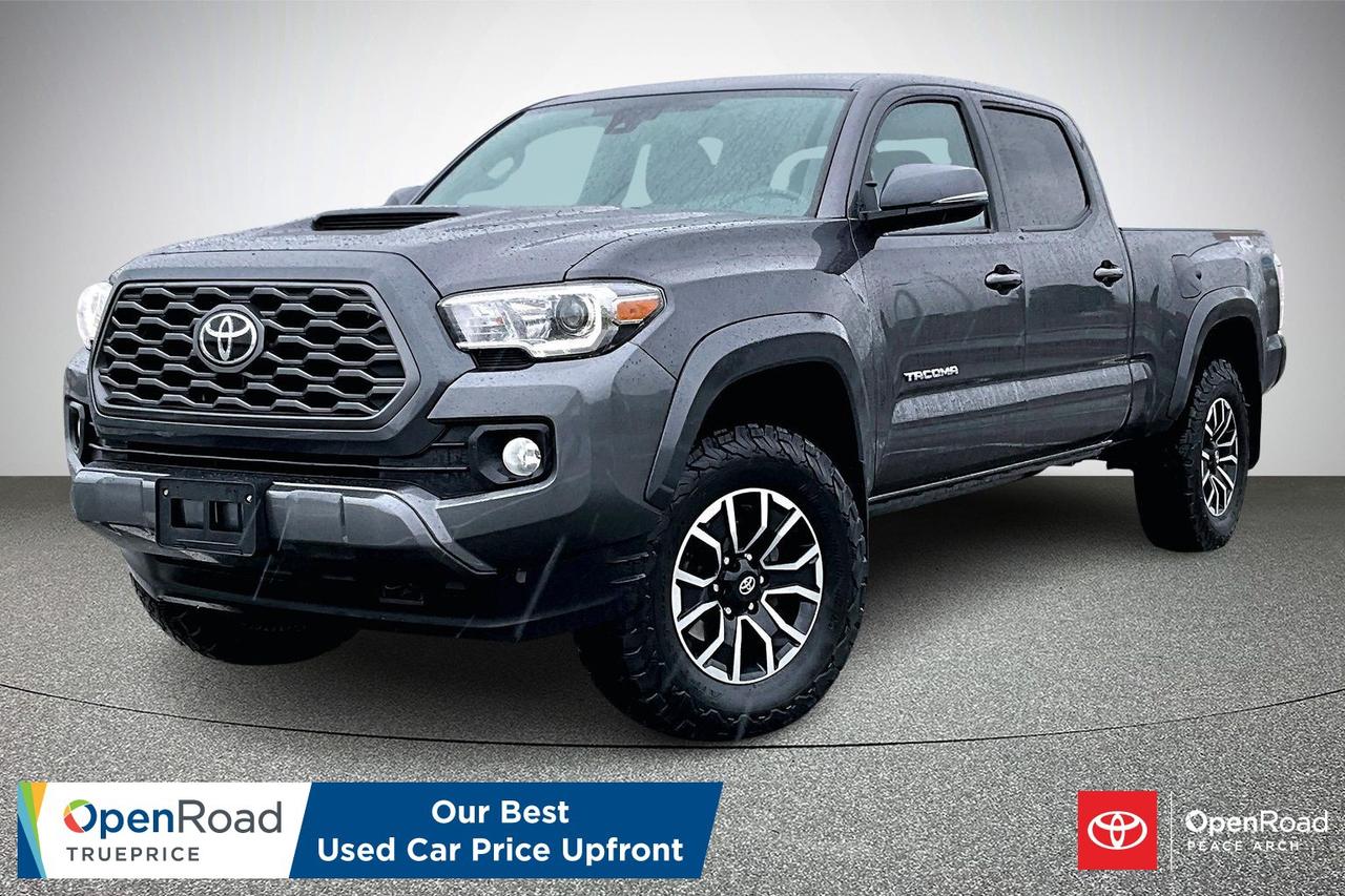The 2022 Toyota Tacoma 4&times;4 TRD Sport Premium combines strong capability with refined features. Its 3.5 L V6 delivers confident performance through a part-time 4WD system and sport-tuned suspension. The exterior includes a hood scoop, 17-inch alloy wheels, and distinct TRD Sport styling. The cabin adds leather-trimmed seating, a power moonroof, wireless charging, and an upgraded audio and navigation system. Practical technology such as a backup camera, blind-spot monitoring, and rear cross-traffic alert enhances daily use. Toyota Safety Sense P provides advanced driver-assist features, offering additional confidence on and off the road.  Have confidence with your OpenRoad purchase! Every OpenRoad Certified Pre-Owned vehicle comes fully reconditioned and complete with a comprehensive 153 point mechanical inspection, a CarFax history & lien report, a 3-Day Money Back Guarantee, a 30-Day/2,000 kms Exchange Policy, a 90-Day/5,000 kms Powertrain Warranty, guaranteed clear title, and membership to our exclusive Club OpenRoad! As a proud member of the OpenRoad Auto Group, a trusted name since 2000 serving the Lower mainland (including White Rock, Surrey, Langley, Maple Ridge, Delta, Richmond, Mission and beyond) with outstanding Toyota vehicles, Toyota parts, and Toyota service since 1966! OpenRoad Toyota Peace Arch is a &ldquo;True Price&rdquo; dealer, meaning no inflated prices, and no need for back and forth haggling! We use up to the minute technology offering LIVE MARKET VALUE PRICING to ensure you are receiving the most competitive price possible on all of our Pre-Owned vehicles!  All advertised vehicle prices do not include our $599 documentation fee.