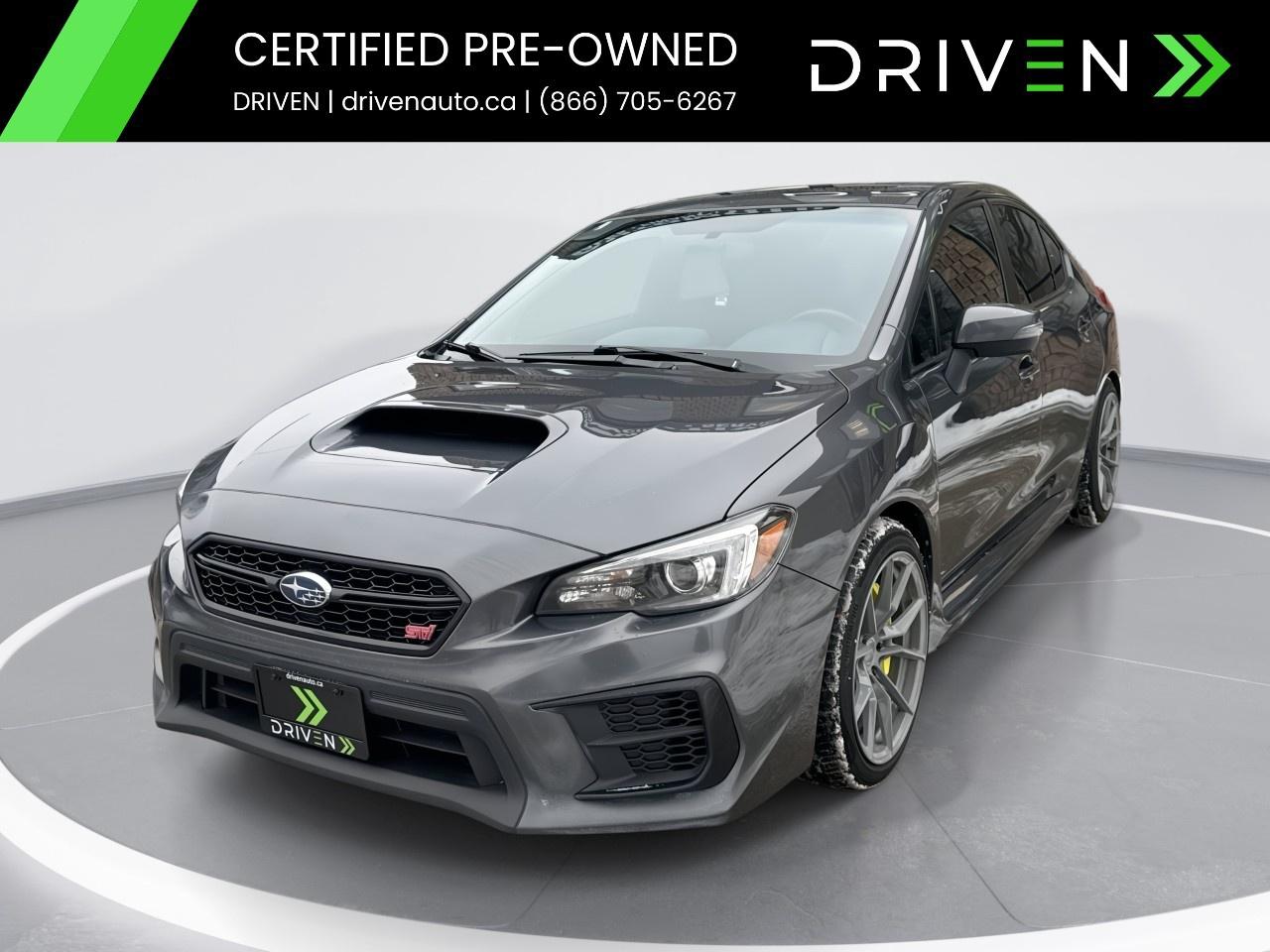 <p><strong>SPECIAL FINANCE PRICE: $26,995</strong></p><p><strong>CASH PRICE: $28,995</strong></p><p><strong>Raw performance meets rally heritage.</strong> This 2020 WRX STI in <strong>Magnetite Grey Metallic</strong> with a <strong>black sport interior</strong> brings the iconic 310-hp turbo Boxer engine, <strong>6-speed manual</strong>, symmetric <strong>AWD</strong>, and Brembo brakes for pure driver engagement.</p><p>Loaded with<strong> sport seats, LED steering-responsive headlights, SI-Drive modes, touchscreen infotainment, sunroof, Apple CarPlay/Android Auto</strong>, and a premium sound system. Safety comes standard with lane assist, cruise control, <strong>rear-view camera, traction/stability control, performance-tuned AWD</strong>, and Subarus legendary all-weather capability.</p> <p><span style=color:black>This vehicle is in<strong>excellent showroom condition</strong>and backed by the<strong>DRIVEN Certified Advantage Program</strong>for complete peace of mind.</span></p><p><span style=color:black><strong>INSPECTION & CERTIFICATION</strong></span></p><p><span style=color:black>This vehicle has undergone a<strong>comprehensive 150-point inspection</strong>by licensed in-house mechanics, assessing its cosmetic, mechanical, and safety condition. It comes<strong>DRIVEN Certified</strong>, which includes our<strong>30-Day / 2,500KM Vehicle Assurance Program</strong>covering any mechanical issues within that period.</span></p><p><span style=color:black><strong>DRIVEN CERTIFIED ADVANTAGE PROGRAM  INCLUDED FOR ALL BUYERS</strong></span></p><p><span style=color:black> 30-Day / 2,500KM Vehicle Assurance Program  Free Delivery up to 200 KM (Ontario-wide delivery available)  Free Carfax Vehicle History Report  Access to Industry-Leading Warranty & GAP Programs  WALKAWAY Protection Available  Fresh Oil Change & New Cabin Air Filter  Meticulously Reconditioned & Professionally Detailed Vehicles</span></p><p><span style=color:black><strong>FINANCING AVAILABLE</strong></span></p><p><span style=color:black>All credit types are welcome! Whether youre a<strong>first-time buyer</strong>,<strong>newcomer to Canada</strong>, or<strong>rebuilding credit</strong>, our<strong>Equifax Certified Finance Team</strong>works to secure your best approval.</span></p><p><span style=color:black>Special Financing Programs are available for an additional<strong>$999</strong>, covering the expert services we provide to secure the<strong>lowest rates, best approvals, and most flexible terms</strong>.</span></p><p><span style=color:black>The<strong>Special Finance Price</strong>reflects a dealer discount and is available only when financing is arranged through<strong>DRIVEN</strong>, on approved credit (O.A.C.). Customers paying cash or using outside financing will pay the full<strong>cash price</strong>listed above.</span></p><p><span style=color:black><strong>CONVENIENCE & EXPERIENCE</strong></span></p><p><span style=color:black> State-of-the-Art Facility in Newmarket, ON  Hundreds of 5-Star Google Reviews  Recognized for expertise and trust  Transparent, Pressure-Free Consultations  Top Dollar for Trades  Well buy your vehicle even if you dont buy ours</span></p><p><span style=color:black><strong>ABOUT DRIVEN</strong></span></p><p><span style=color:black><strong>DRIVEN</strong> Anything but your typical dealership. Your one-stop destination for<strong>buying, selling, and servicing vehicles</strong>, built on transparency, trust, and a people-first approach.</span></p><p><span style=color:black>Visit us today at<strong>220 Mulock Drive, Newmarket, ON L3Y 9B7</strong> Or explore our full inventory and get<strong>pre-approved in minutes</strong>with<strong>no credit impact</strong>at</span><a target=_blank rel=noopener noreferrer nofollow href=http://www.drivenauto.ca><span style=color:blue>www.drivenauto.ca</span></a></p><p><span style=color:black>In accordance with<strong>OMVIC regulations</strong>, the listed<strong>cash price</strong>is the total all-in price excluding taxes and licensing. The<strong>Special Financing Price</strong>reflects dealer incentives available only when financing is arranged through DRIVEN (O.A.C.).</span></p><p><span style=color:black>***Although every effort is made to ensure accuracy, we are not responsible for any errors or omissions. Prices and availability may change without notice. Please call or email us directly to confirm details.***</span></p>