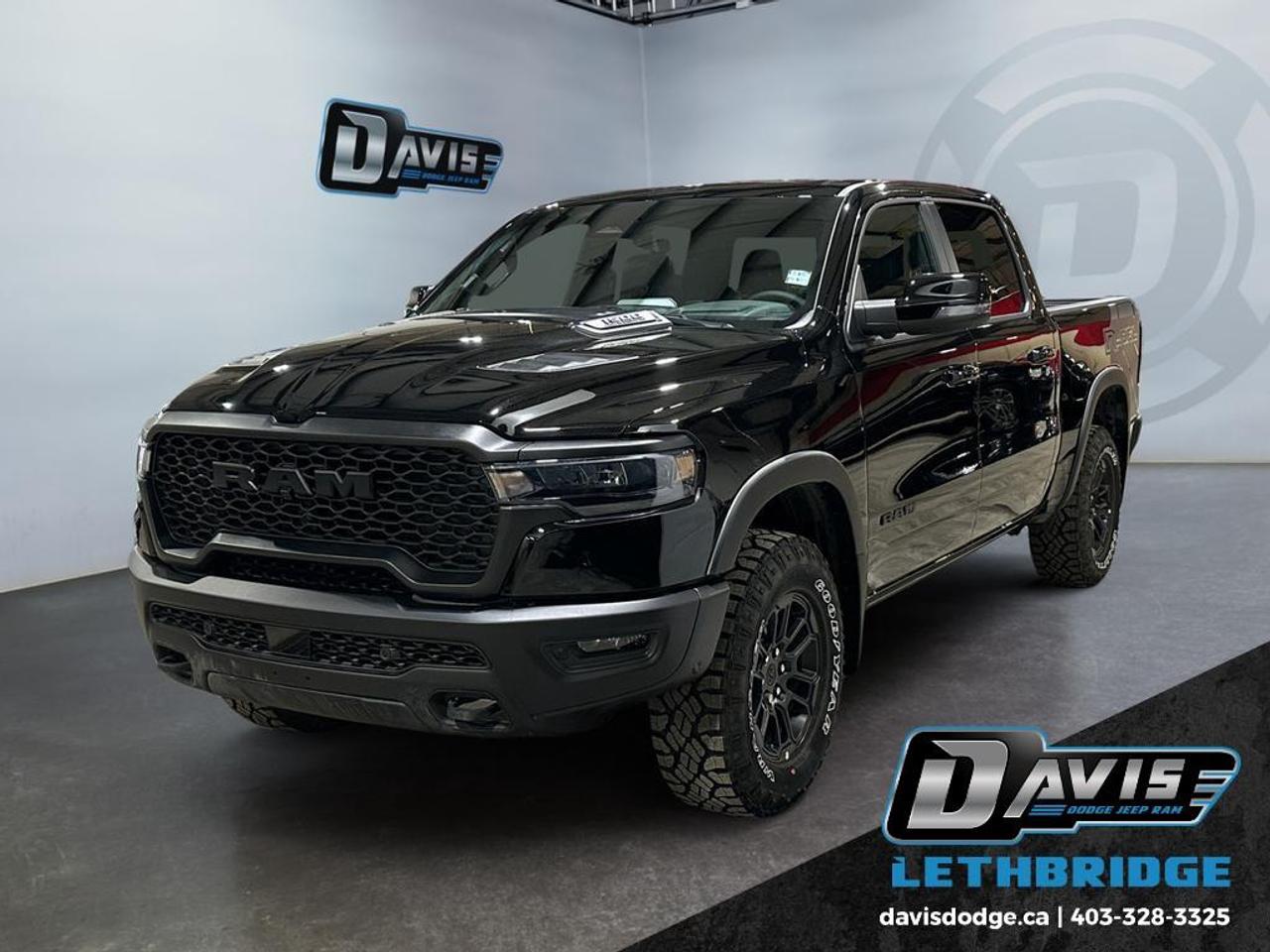 <b>Off-Road Suspension, Navigation, Apple CarPlay, Android Auto, Adaptive Cruise!<br /> <br /></b><br /> <br /> <br />The 2026 Ram 1500 Rebel Crew Cab 4x4 in Diamond Black Crystal combines aggressive style with advanced off-road capability. Powered by a 3.0L Hurricane twin-turbo I6 and 8-speed automatic transmission, it features electronic locking rear axle, performance-tuned shocks, all-terrain tires, and raised ride height for unmatched off-road performance.<br /><br />Inside, enjoy luxury leather-trimmed bucket seats with ventilation and heating, dual-zone climate control, full-length upgraded floor console, heated steering wheel, 14.4-inch Uconnect touchscreen with navigation, Apple CarPlay, Android Auto, wireless charging, and Harman Kardon premium audio.<br /><br />Safety tech includes Adaptive Cruise with Stop & Go, Forward Collision Warning, Pedestrian Emergency Braking, Blind-Spot Monitoring, Lane Assist, ParkSense Front/Rear Assist, and a 360° digital rearview camera. Rugged, tech-packed, and ready for any adventure.<br /> <br />To apply right now for financing use this link: <a href=https://lethbridge.davisdodge.ca/free-credit-check/ target=_blank rel=nofollow noopener noreferrer>https://lethbridge.davisdodge.ca/free-credit-check/</a><br /><br /> <br /><br />As a premier Chrysler, Dodge, Jeep and RAM dealership, Davis Dodge proudly offers an extensive selection of new and used vehicles to meet every drivers needs. Customers across Lethbridge, Fort Macleod, Taber, Claresholm, Coaldale, and beyond trust us for daily vehicle specials, certified service and parts, and a seamless online inventory experience. <br /><br /> With competitive financing options and expert support, we make car buying easy and enjoyable. <br /><br /> Ready to hit the road? Schedule your test drive today at Davis Dodge, your trusted Chrysler, Dodge, Jeep and RAM dealer in Lethbridge, Alberta.<br /><br /> Vehicle pricing offer shown expires 2026-05-31. <br /> Come by and check out our fleet of 70+ used cars and trucks and 110+ new cars and trucks for sale in Lethbridge. o~o