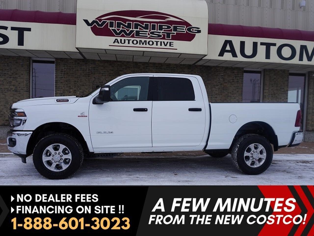*** Dealer arranged financing on site! Quick, Simple,  no calls or waiting on bank appointments required!! Drive away today ***   NO ADMINISTRATION FEES!!

***BRAND NEW TRUCK ONLY 133 KMS**** NEW 2025 RAM 2500 BIG HORN CREW CAB 4X4 Unstoppable Power Meets Bold Style. Turn heads on the road and command any job site with this 2025 Ram 2500 Big Horn 4x4. Finished in Bright White with sleek chrome package, this truck combines pure muscle, refined comfort, and cutting-edge tech in one unstoppable package. 

PERFORMANCE THAT MEANS BUSINESS

- Legendary 6.7L Cummins&reg; I-6 High-Output Turbo Diesel Engine making incredible 430 horsepower and 1,075 lb-ft of torque
- ALL NEW 8-Speed TorqueFlite&reg; HD Automatic Transmission for smooth, heavy-duty performance
- 3.42 Axle Ratio for confident towing and hauling
- 5th Wheel & Gooseneck Towing Prep Group factory ready for your biggest jobs
- Class V Hitch Receiver, 4 & 7-Pin Wiring Harnesses, and Trailer Tow Pages
- Trailer Sway Control, Hill Start Assist, and Engine Block Heater for all-weather control
- Power Folding and Power Extendable Tow mirrors
- Aggressive 18-Inch Bright Polished Aluminum Wheels
- Chrome Badging, Grille, and Accents
- ALL NEW LED Headlamps & Fog Lamps for maximum visibility
- Locking Tailgate with dampening, durable, secure, and built to last
- Tough never looked this sharp.

TECH THAT KEEPS YOU CONNECTED

- Uconnect&reg; 5 NAV with 8.4-Inch Touchscreen Display
- Apple CarPlay&reg; and Android Auto integration
- Alexa Built-In, SiriusXM&reg; with 360L, and Connected Travel & Traffic Services
- 9-Speaker Alpine&reg; Premium Audio System with Subwoofer
- 4G LTE Wi-Fi Hotspot for work or play on the go
- Command the road and your digital world from the drivers seat.

COMFORT & CONVENIENCE FOR EVERY MILE

- Premium Black Cloth Bucket Seats
- Heated Front Seats and Heated Steering Wheel for all-season comfort
- Power 8-Way Adjustable Driver Seat
- Dual-Zone Automatic Temperature Control
- Power Folding and telescoping towing mirrors
- Fold-Flat Load Floor with Storage
- Luxury Steering Wheel and Remote Start System
- A truck that works as hard as you do  but never forgets comfort.

CONFIDENCE THROUGH TECHNOLOGY

- Full-Speed Forward Collision Warning Plus
- Pedestrian/Cyclist Emergency Braking
- Adaptive Cruise Control with Stop
- Park-Sense&reg; Front & Rear Park Assist System
- ParkView&reg; Rear Back-Up Camera
- Blind spot & Cross Path Detection
- Electronic Stability Control, Brake Assist, and Trailer Light Check
- Safety and control you can count on, no matter where the road leads.

THE COMPLETE PACKAGE

This 2025 Ram 2500 Big Horn Crew Cab 4x4 delivers everything from Cummins-powered strength to high-end luxury and the latest in connectivity and safety. Its more than just a truck  its a statement. Bold looks. Big power. Built Ram strong. 

Comes with a Manitoba Safety Certification, and we have many Extended Powertrain warranties available on your vehicle purchase up to 10-year coverage (on eligible vehicles see dealer for details). Financing on site with Zero down financing OAC. Trades accepted. View at Winnipeg West Automotive Group, 5195 Portage Ave. (only a couple of minutes past the new Costco) Dealer permit # 6007, Call now 1(888) 601-3023. This Car is located in Winnipeg Manitoba,  however we can have it shipped anywhere in North America relatively inexpensively.