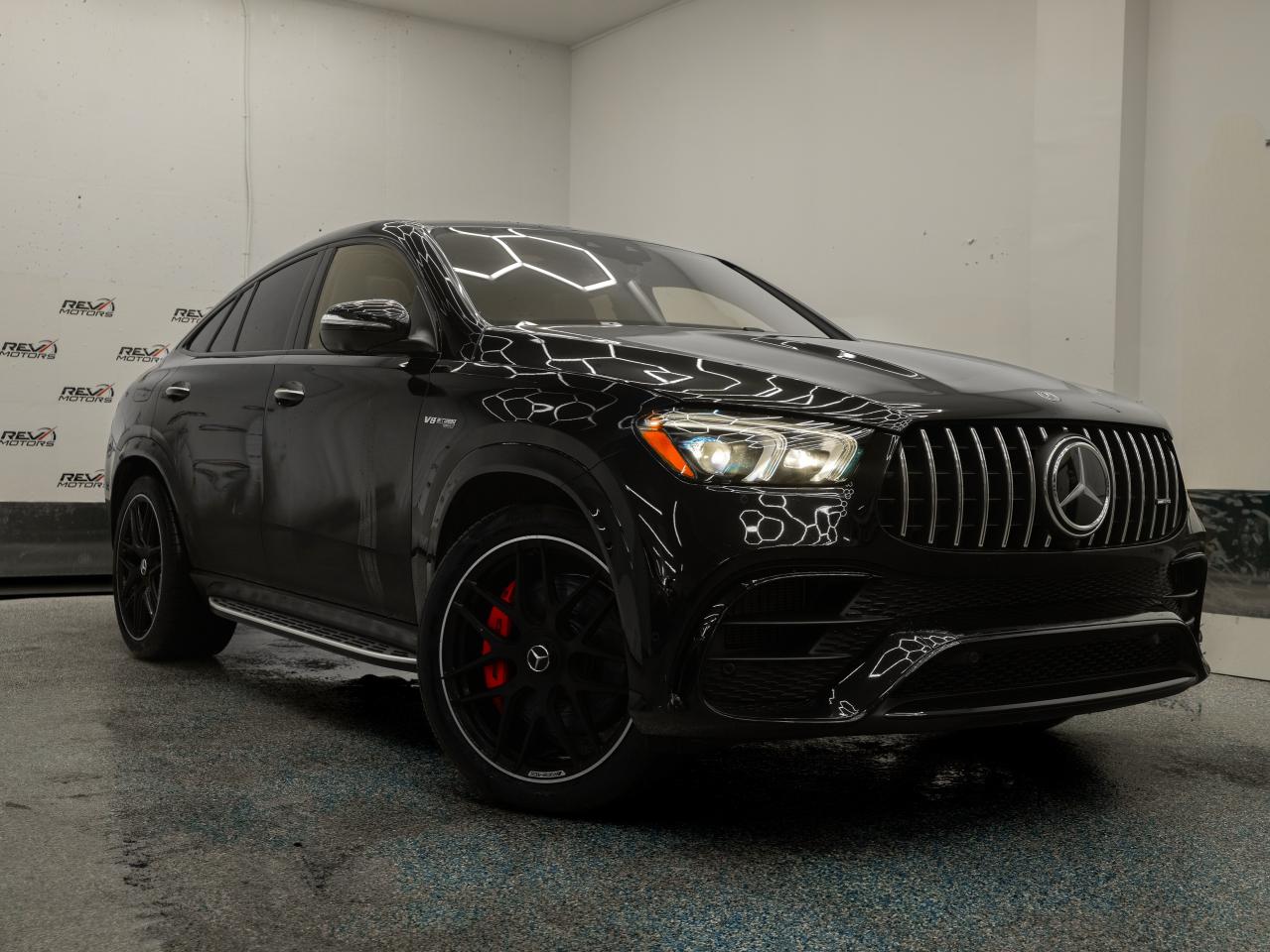 2022 Mercedes-Benz AMG GLE 63 S | Carbon Trim | BIG Burmester Sound System<br/> <br/> -MORE PHOTOS COMING SOON- <br/> <br/> <br/> Obsidian Black Metallic Exterior | AMG Exclusive Red Nappa Leather Interior | 22-Inch AMG Forged Wheels | AMG Night Package | LED Dyanmic Multibeam Headlights | Panoramic Sunroof | Heated & Ventilated Front Seats | Heated Rear Seats | Heated Armrests | 4-Zone Climate Control | 12.3-Inch MBUX Touchscreen | Apple CarPlay® & Android Auto | Navigation | Burmester® Surround Sound | AMG Performance Exhaust | Active Multicontour Seats with Massage | Surround View Camera | Blind Spot Assist | Active Lane Keeping Assist | Rear Cross-Traffic Alert | AMG SPEEDSHIFT® TCT 9-Speed Transmission | Handcrafted AMG 4.0L V8 Biturbo | 603 Horsepower | 627 lb-ft Torque | 4MATIC+ All-Wheel Drive | and more <br/> <br/> <br/> Manufaturer Packages <br/> Keyless Go Package | Driving Assistance Package (L2) | Air Quality Package | Parking Package High | Mirror Package | AMG Exterior Night Package | Anti-Theft Protection Package Plus | Acoustic Comfort Package | AMG Dirvers Package And Much more <br/> <br/> <br/> The 2022 Mercedes-Benz AMG GLE 63 S delivers a masterful blend of ultra-high performance, first-class luxury, and cutting-edge technology. With its striking black exterior and bold red AMG interior, this SUV commands attention on the road and exudes pure performance inside and out. <br/> <br/> <br/> Key Features: <br/> <br/> <br/> Commanding Design: <br/> Dressed in Obsidian Black Metallic with aggressive AMG styling, the GLE 63 S stands out with its bold grille, forged wheels, and AMG Night Package accents. The LED lighting and muscular stance highlight its athletic presence. <br/> <br/> <br/> First-Class Comfort: <br/> Inside, the AMG Red Nappa leather cabin elevates luxury to new heights. Enjoy heated and ventilated front seats, heated rear seats, a panoramic sunroof, and multicontour massage seats designed to make every drive feel like a premium experience. <br/> <br/> <br/> Supercar-Level Performance: <br/> Powered by a hand-built AMG 4.0L V8 Biturbo producing 603 hp and 627 lb-ft of torque, this GLE rockets from 0100 km/h in just over 3 seconds. With AMG Performance 4MATIC+, adaptive air suspension, and the AMG Performance Exhaust, it delivers breathtaking acceleration and dynamic handling. <br/> <br/> <br/> Intelligent Connectivity: <br/> The dual 12.3-inch MBUX displays, Apple CarPlay®, Android Auto, voice assistant, and Burmester® audio system ensure seamless technology and rich sound quality. Navigation, wireless charging, and customizable AMG displays keep you connected and engaged. <br/> <br/> <br/> Advanced Safety: <br/> With Blind Spot Assist, lane keeping assist, cross-traffic alert, a surround view camera, and advanced driver assistance features, the GLE 63 S adds confidence and protection to its powerful driving experience. <br/> <br/> <br/> The 2022 Mercedes-Benz AMG GLE 63 S is the ultimate performance luxury SUVcombining handcrafted power, exquisite craftsmanship, and next-generation technology for drivers who demand the absolute best in every journey. <br/> <br/> <br/> This Vehicle Has Travelled 46,174 Kms. <br/> <br/> <br/> *** NO additional fees except for taxes and licensing! *** <br/> <br/> <br/> *** 100-point inspection on all our vehicles & always detailed inside and out *** <br/> <br/> <br/> RevMotors is at your service to ensure you find the right car for YOU. Even if we do not have it in our inventory, we are more than happy to find you the vehicle that you are looking for. Give us a call at 613-791-3000 or visit us online at www.revmotors.ca <br/> <br/> <br/> Ça nous donnera du plaisir de vous servir en Français aussi! <br/> <br/> <br/> CERTIFICATION * All our vehicles are sold Certified for the province of Ontario (Quebec Safety Available, additional charges may apply) <br/> FINANCING AVAILABLE * RevMotors offers competitive finance rates through many of the major banks. Should you feel like youve had credit issues in the past, we have various financing solutions to get you on the road. We accept No Credit - New Credit - Bad Credit - Bankruptcy - Students and more!! <br/> EXTENDED WARRANTY * For your peace of mind, if one of our used vehicles is no longer covered under the manufacturers warranty, RevMotors will provide you with a 6 month / 6000KMS Limited Powertrain Warranty. You always have the options to upgrade to more comprehensive coverage as well. Well be more than happy to review the options and chose the coverage thats right for you! <br/> TRADES * Do you have a Trade-in? We offer competitive trade in offers for your current vehicle! <br/> SHIPPING * We can ship anywhere across Canada. Give us a call for a quote and we will be happy to help! <br/> <br/> <br/> Buy with confidence knowing that we always have your best interests in mind! <br/>